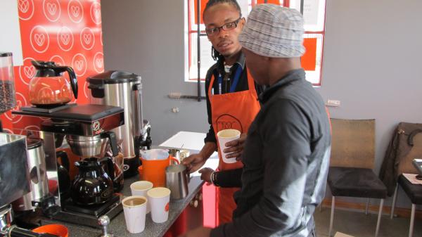 Vuyile Msaku and Vusumzi Mamile preparing an order. Photo by Mary-Anne Gontsana