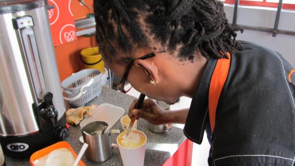 Vuyile Msaku, a coffee barista. Photo by Mary-Anne Gontsana