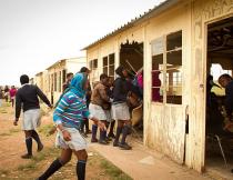 Learners outside a dilapidated classroom in the Eastern Cape