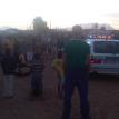 Community and police meet in field. Photo by Janine Fortuin. Community and police meet in field. Photo by Janine Fortuin.