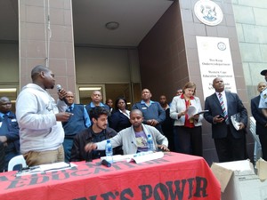 Photo of Equal Education handing over social audit at Western Cape government offices