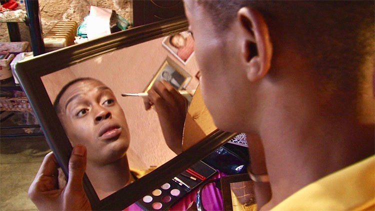 Photo of a person putting on make-up