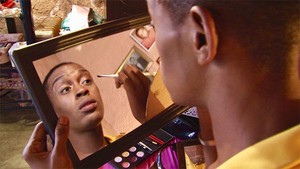 Photo of a person putting on make-up