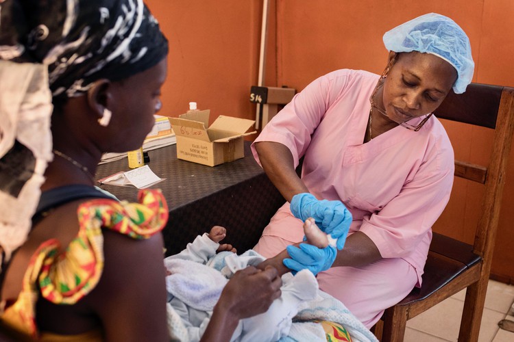 Photo of a nurse and a baby