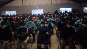 Photo of Nduli residents sitting in the hall