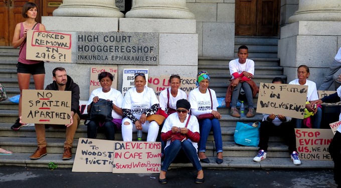 Photo of residents on steps of court
