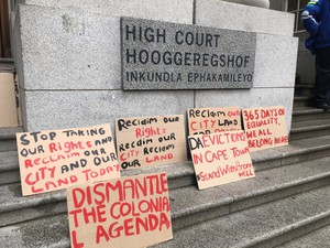 Photo of placards at court