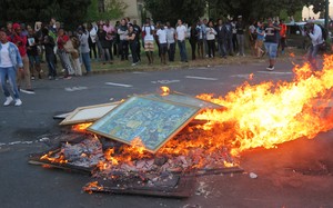 Photo of artwork being burnt on UCT.