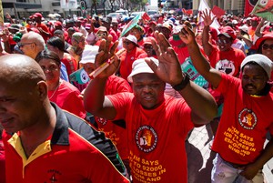 Photo of marchers in red t-shirts
