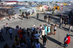 Photo of protesters at school in Joe Slovo