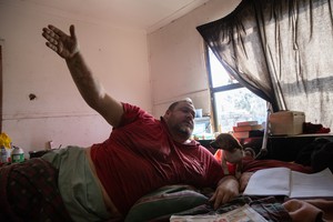 Photo of a man in bed