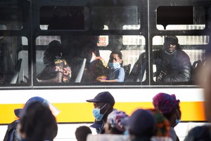 Photo of people on bus