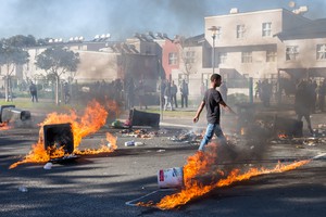 Photo of burning barricades at Steenvilla