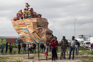 Youth from Vrygrond build a sculpture titled "Ubuntu"