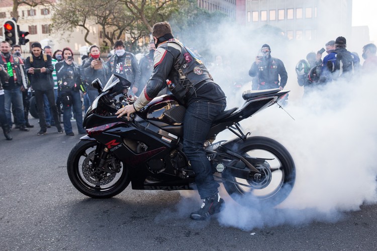 A biker “burns rubber” during the farm murder protest in south africa