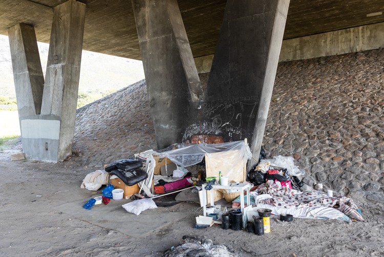 Seven people live under a bridge along the M3 highway.