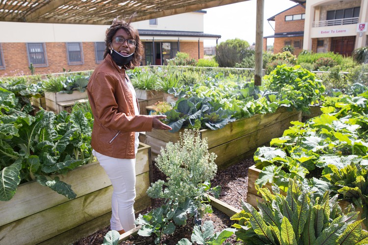 Photo of a person in a garden