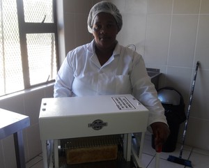 Photo of woman at bread machine