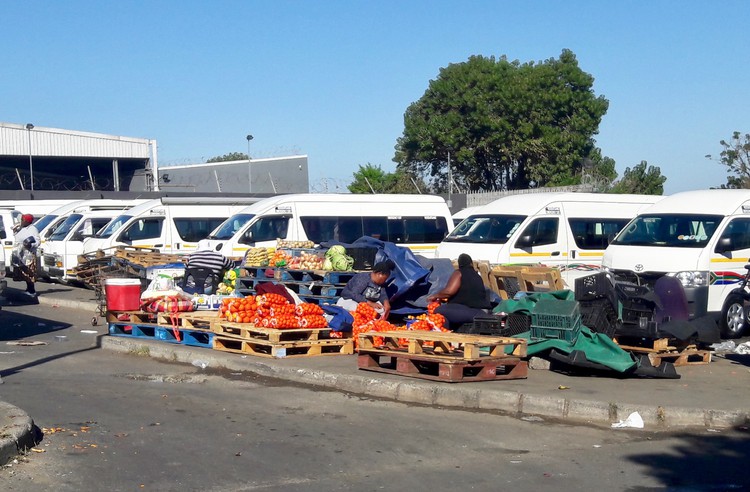 Photo of fruit sellers at a taxi rank