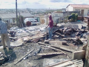 Photo of fire debris in an informal settlement