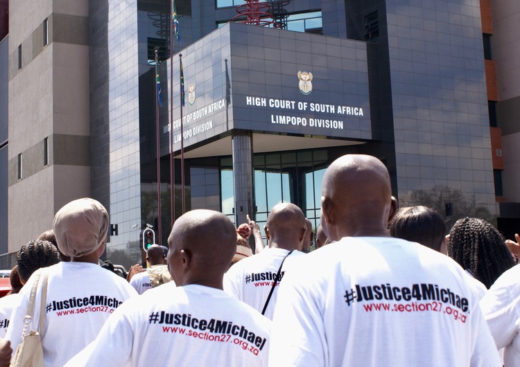 Photo of people protesting outside Polokwane High Court