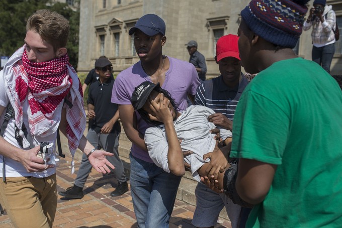 Photo of student being carried