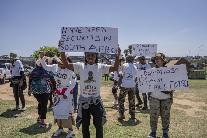 Members of the anti-immigration vigilante group known as Operation Dudula during a protest staged by the group during the G20 leaders summit near Nasrec in Johannesburg, South Africa.