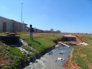 Photo of man and drain