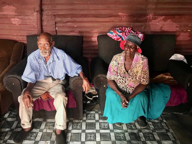 Photo of an elderly couple sitting