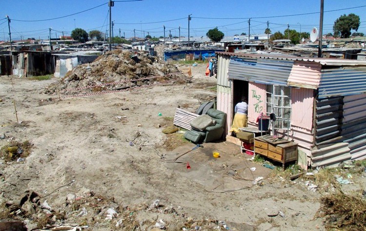 Photo of shacks and open land