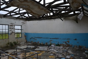 Photo of broken roof in school