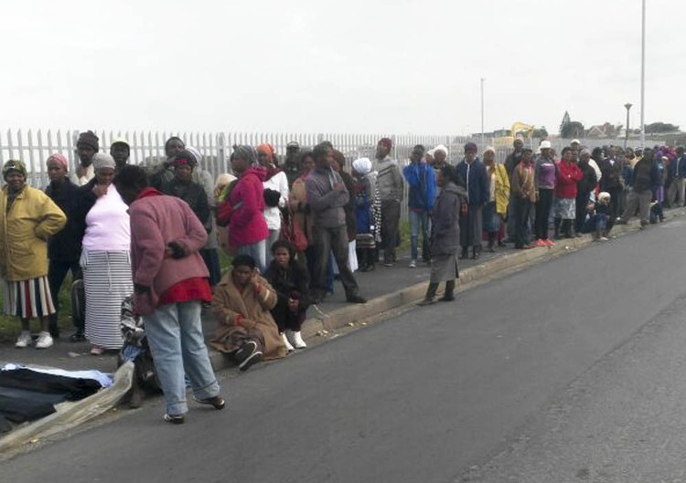 Photo of people in a queue