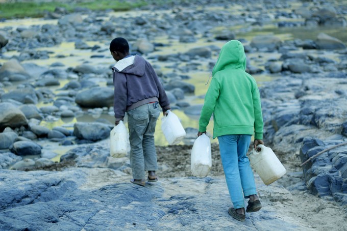 They will have to jump over rocks to get to a convenient point to fill their water bottles.