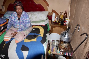 Photo of woman in shack