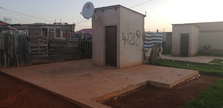 Photo of toilet on cement foundation