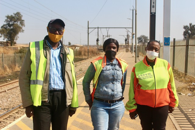 Photo of three people