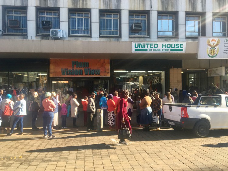 Photo of queues outside a building