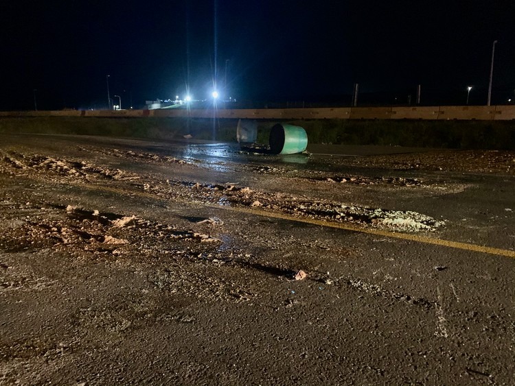 Photo of a street at night