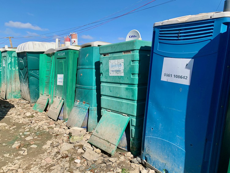 Photo of a row of portable toilets