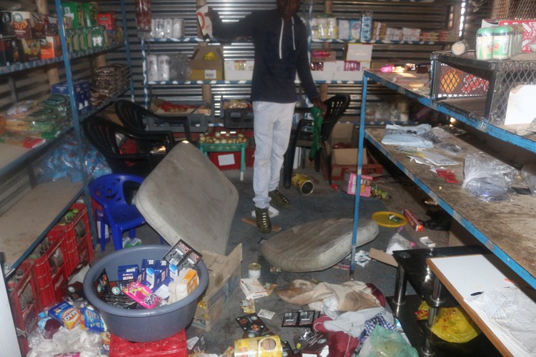 Photo of man inside shop