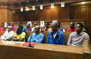 Photo of workers in court