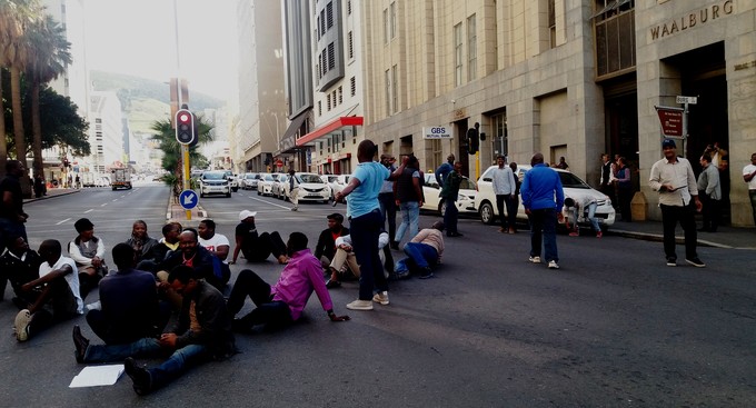 Photo of Uber drivers protest in the city centre.