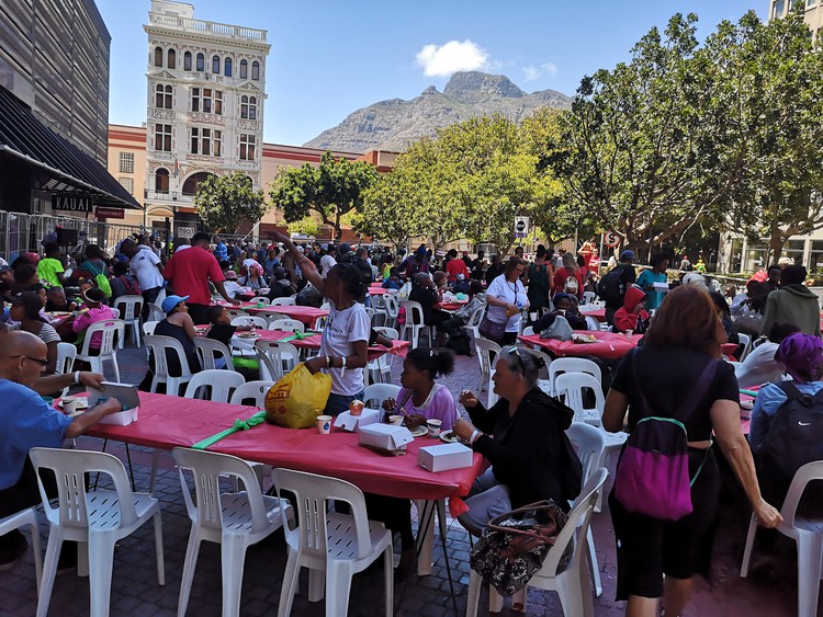 Photo of people seated at the lunch