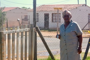 Photo of a woman at her house