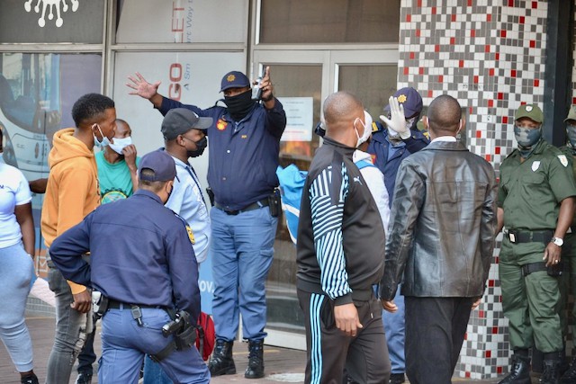 Photo of police and protesters