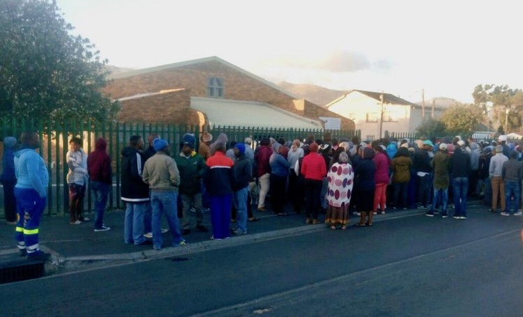 Photo of people outside a community hall