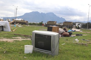 Photo of TV in demolished shack