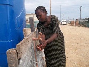 Photo of woman washing hands