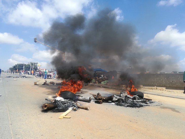 Photo of burning tyres in road
