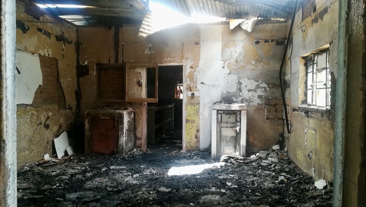 Photo of a room gutted by fire